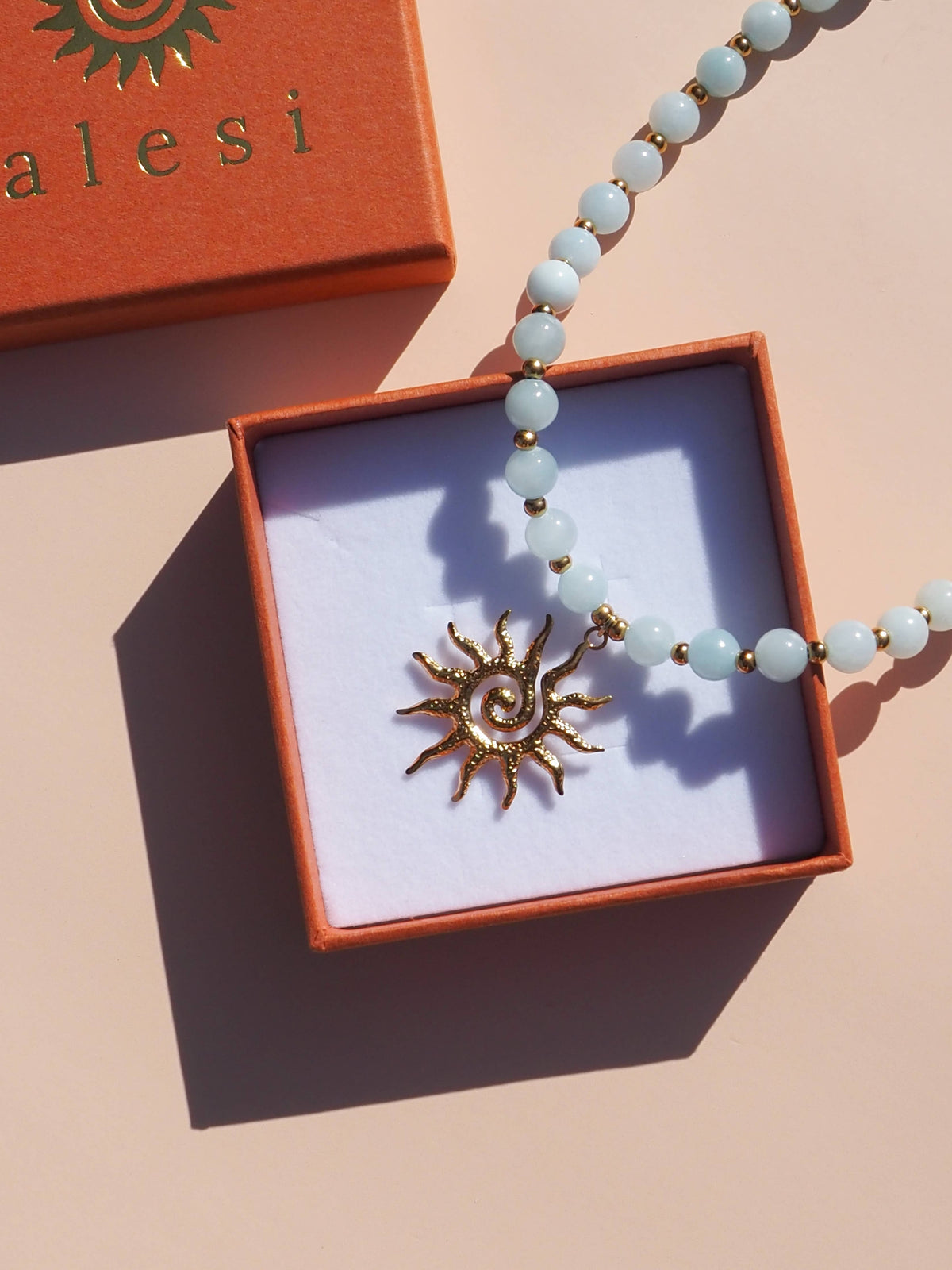 Blue Spiral Sun Necklace