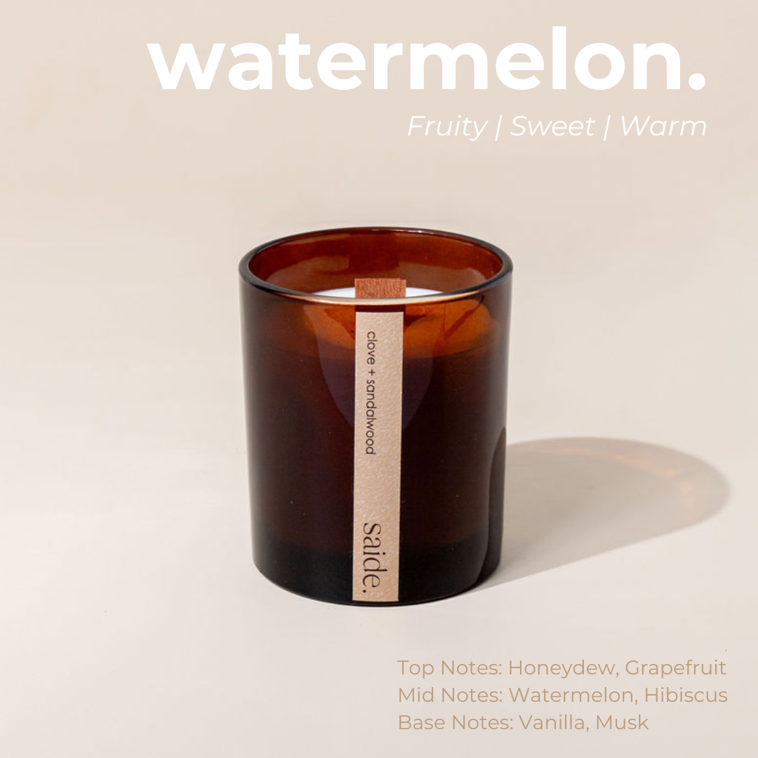 Brown candle with a wooden wick on a beige background, featuring the brand 'saide'.