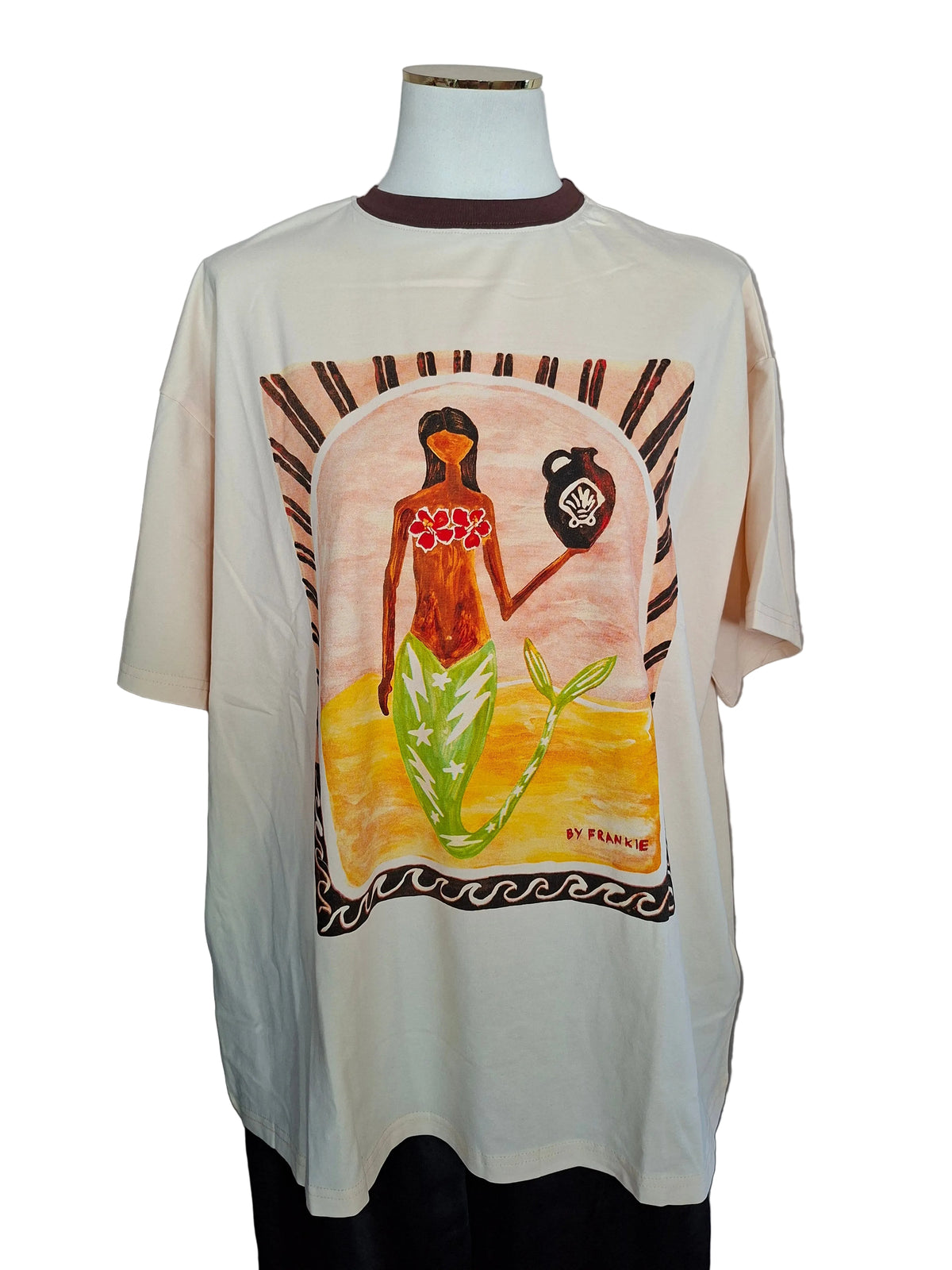 Nude coloured T-shirt with a mermaid holding a vase printed on the front. As worn on a mannequin