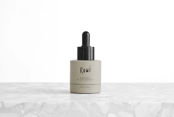 Ruwi serum bottle with black lid on a white background