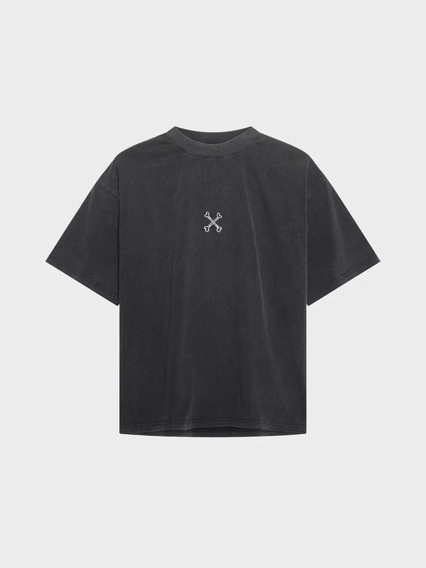 Black t-shirt with a small white logo on the back against a light gray background